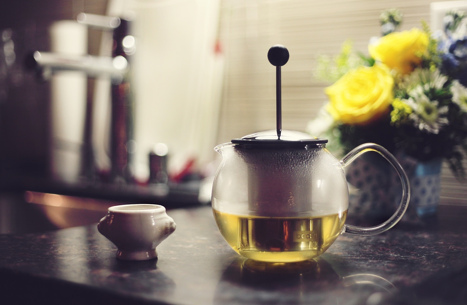 Cup and pot of green tea