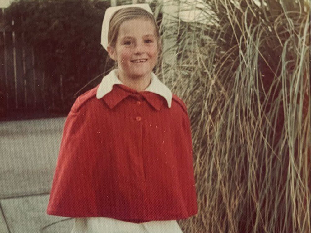 Photo of young Janene dressed up as nurse