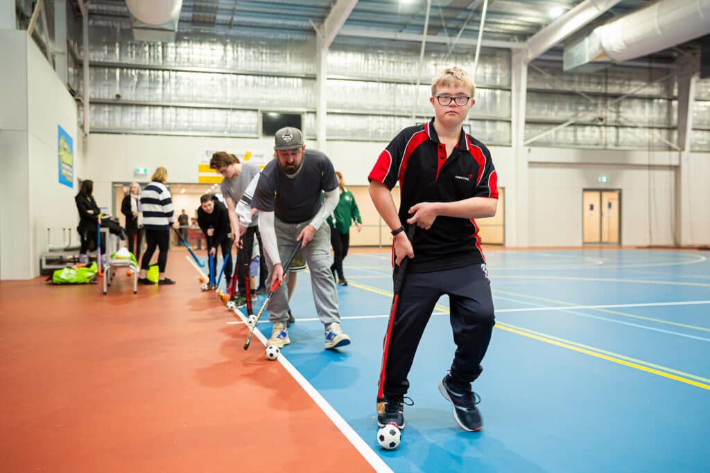 Photo of people practising hockey