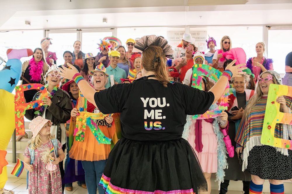 Photo of Feros Care team members preparing for the annual Feros Care Coolangatta Pride March