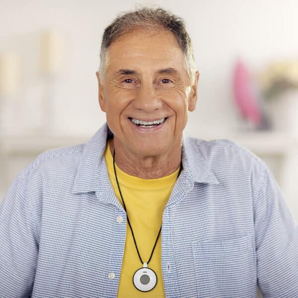 Photo of senior wearing Advanced Fall Detector Pendant necklace