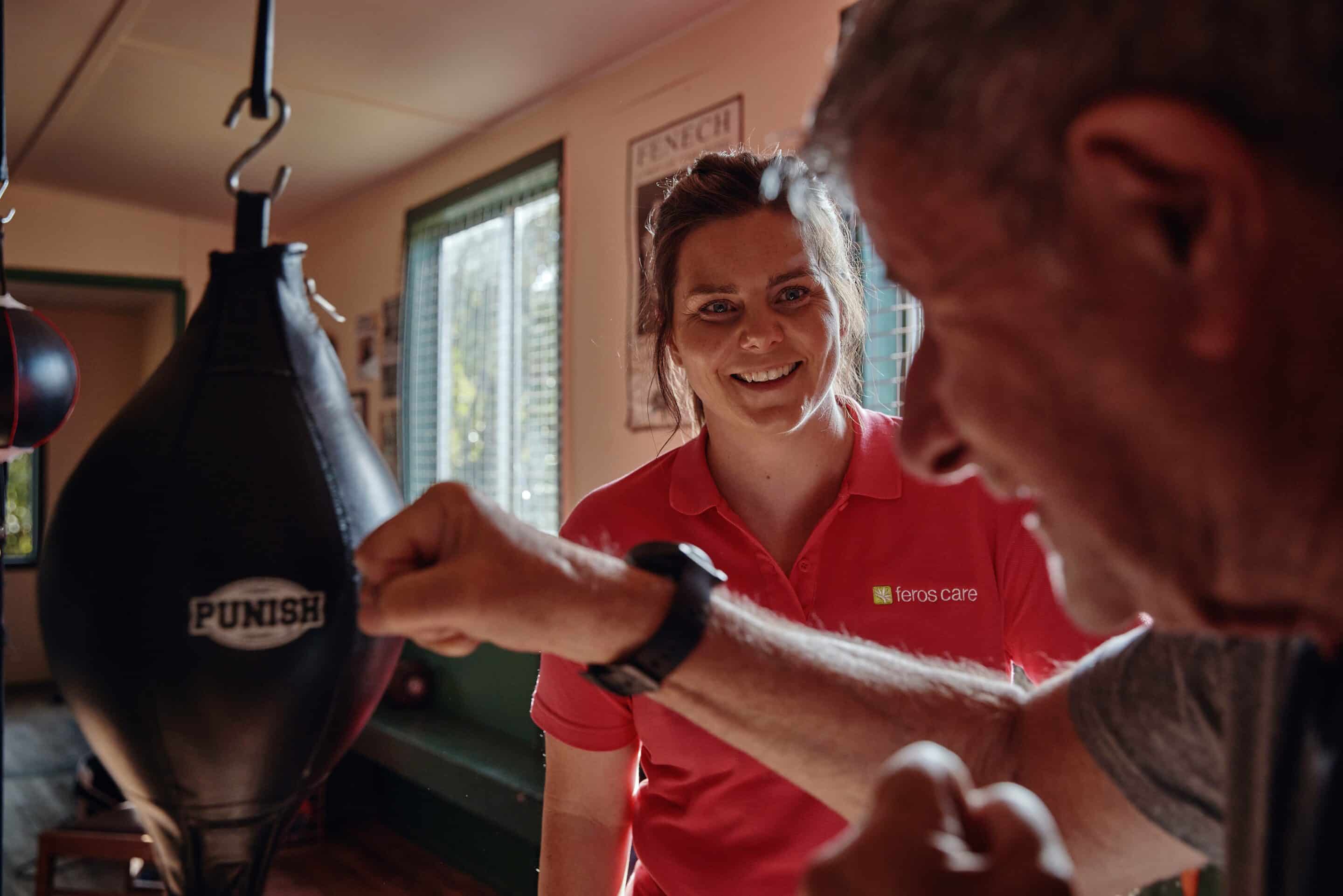 Feros Care physiotherapist Kerry Handly with client Darryl Ferney