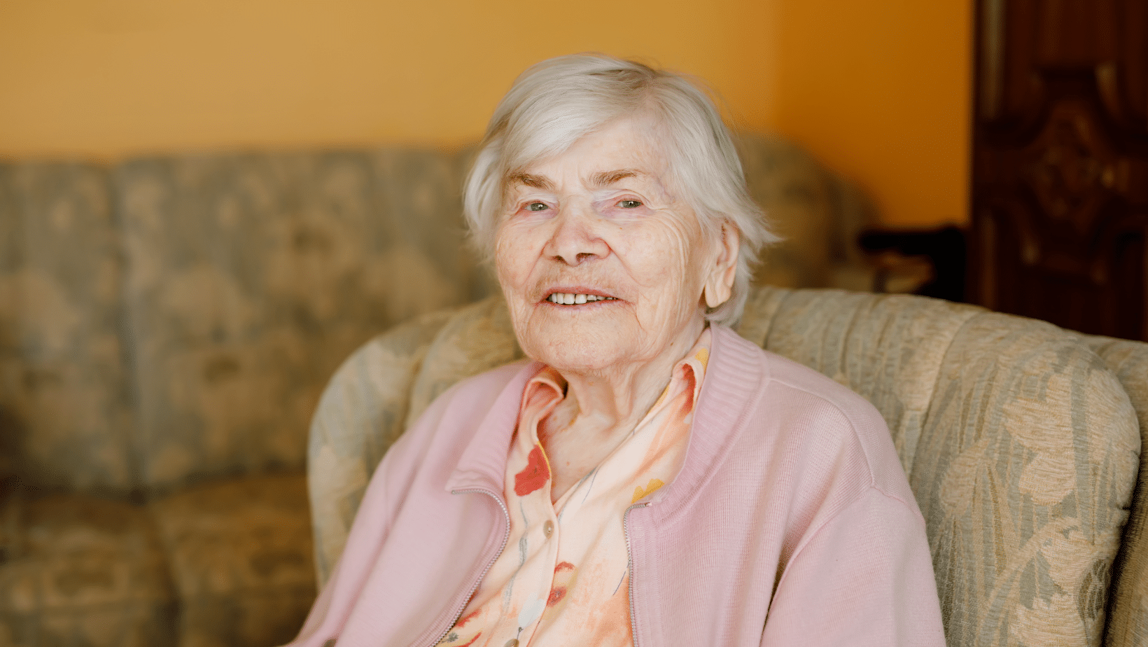 Ninety year-old woman smiling at the camera